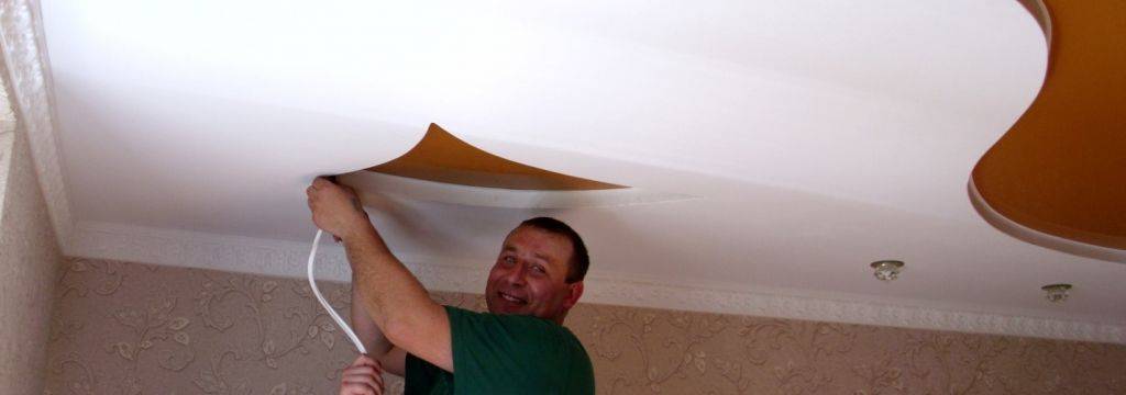Демонтаж натяжного тканевого потолка и ремонт после протечки в квартире
