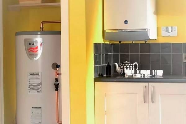 Способы скрытия газового котла на кухнях