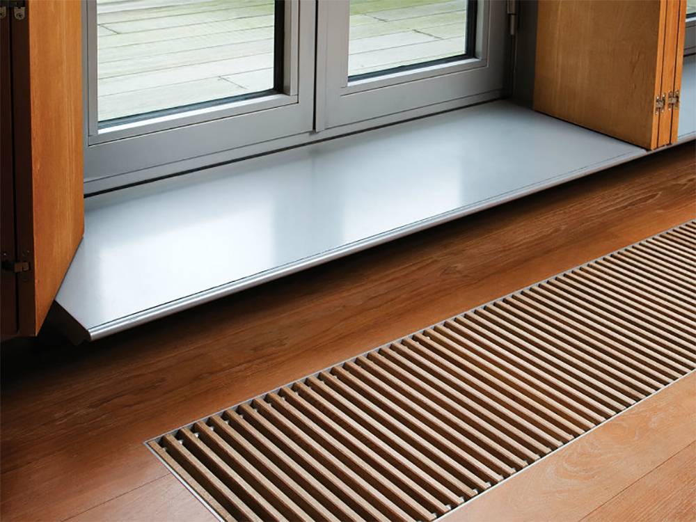 Радиаторы отопления в полу: как обогреть помещение со